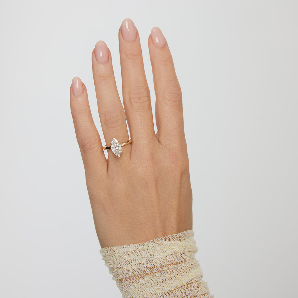 Margot_Marquise_Hand_Yellow_Gold_Solitaire_Ring_White_Gold_Platinum